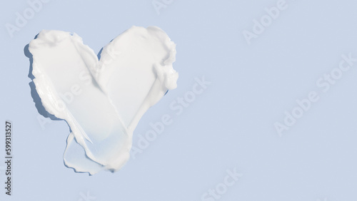 Beauty skincare cream texture swipe swatch in heart shaped. White beauty cream smear smudge isolated on blue background