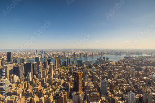 Panoramic view till down with of Empire State Building on skyscrapers buildings Manhattan. New York, USA.
