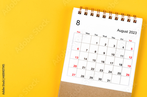 A August 2023 Monthly desk calendar for 2023 year on yellow background.