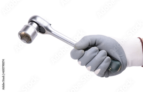 A hand in a protective glove holds a ratchet wrench (socket) on a white background.