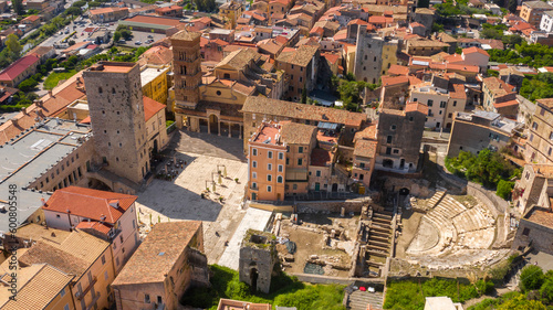 Aerial view of the Roman theater and the Co-Cathedral of San Cesareo and Duomo of Terracina, in the province of Latina, Italy. These monuments are located in the historic center of the town.