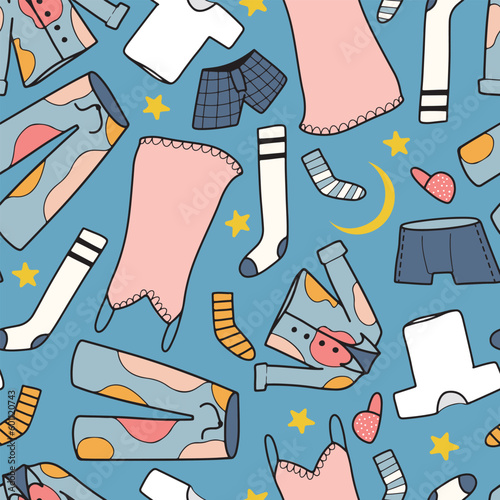 Hand drawn vector seamless pattern with cute night clothes, pyjamas and chemise