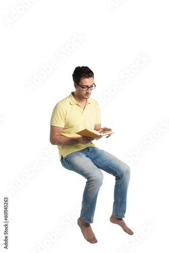 Passionate student sitting and reading a book