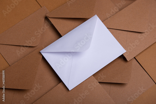 kraft and white paper envelopes close up, mockup