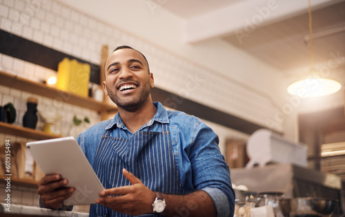 Waiter, tablet and manager with man in cafe for online, entrepreneurship or startup. African, technology and food industry with small business owner in restaurant for barista, planning or coffee shop