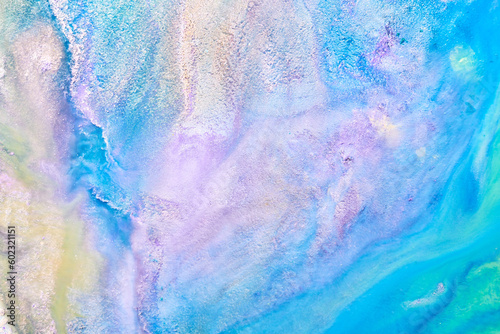 Multicolored creative abstract background. Lilac alcohol ink. Waves, stains, spots and strokes of paint, marble texture