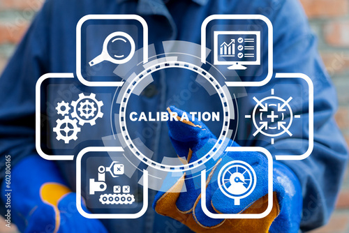 Technician using virtual touchscreen clicks text: CALIBRATION. Concept of activate calibration, intermediate check or calibration measurement. Industrial calibration operations.