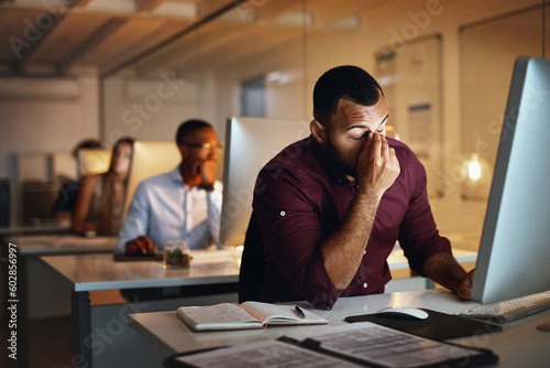 Business, night and man with stress, headache and burnout with new project, deadline and tired. Male person, employee and consultant with a migraine, pain and overworked and professional working late