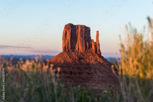 Close up of one of the main mountains in Monument Valley at suns