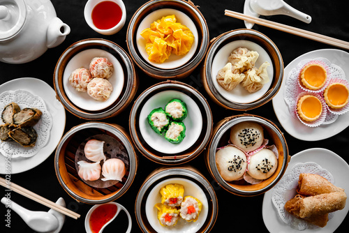 Variety of Dim Sum Flatlay Photography on black table