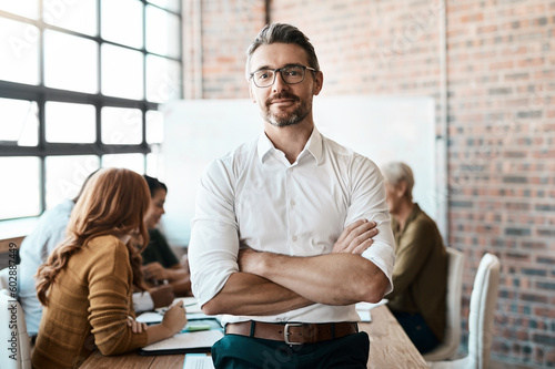 Portrait, leader and man with arms crossed, startup success and manager with teamwork. Face, male employee and entrepreneur with confidence, collaboration and leadership with new project and meeting