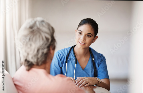 Support, healthcare and nurse with a senior patient explaining a diagnosis after consultation. Medical, empathy and female caretaker volunteer consoling an elderly lady in retirement at nursing home.