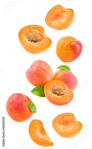flying apricot fruits with slices and green leaf isolated on white background. clipping path