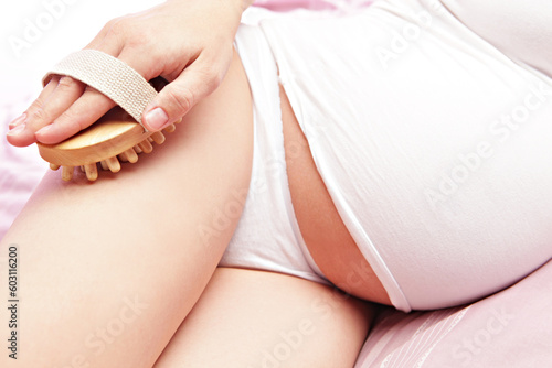 Pregnant woman in bed. Skin care