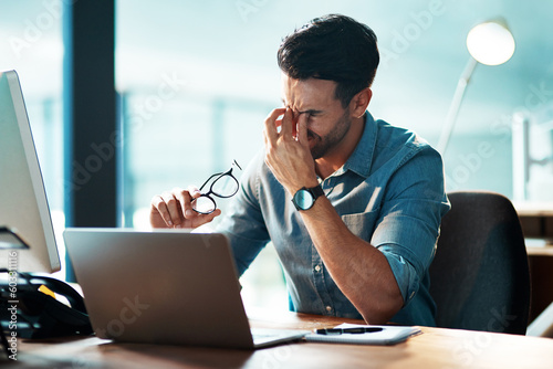 Eye strain, headache and business man at laptop with stress, mental health problem and brain fog. Tired, frustrated and confused worker at computer with fatigue, burnout and pain of vertigo in office
