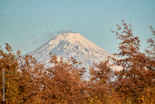 Villarrica volcano of the city of Villarrica in Chile with autumn colors