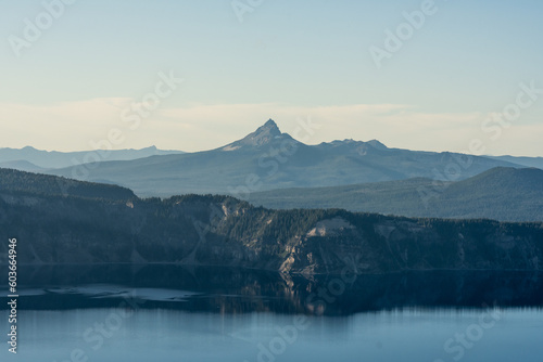 Cliffs Over Crater Lake With Mt. Thielsen In The Distance