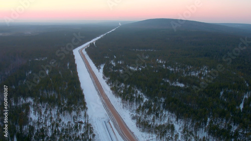 Aerial view of road in forest at winter