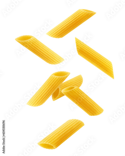 Falling raw Penne Rigate, uncooked Italian Pasta, isolated on white background, full depth of field