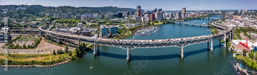 Portland Downtown, Oregon located at river Willamette, panoramic aerial cityscape view with modern and old buildings, the Marquam Bridge, Hawthorne Bridge, Morrison Bridge and Burnside Bridge