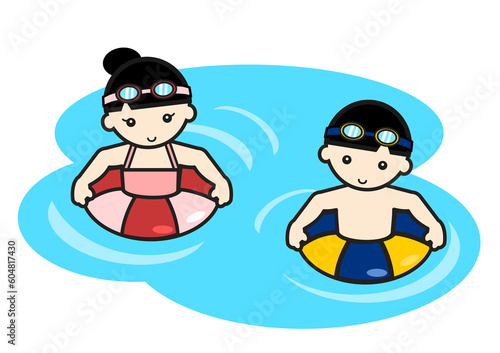 浮き輪をつけて泳ぐ子供たち
