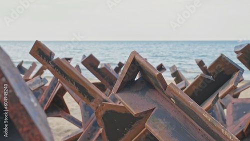 Military Defensive Anti Tank Infantry Metal Obstacles Preventing Sea Invasion Landing Deployed on Beach