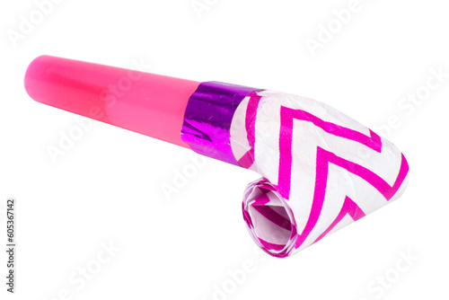 Rolled festive noisemaker or party whistle horn on the white isolated