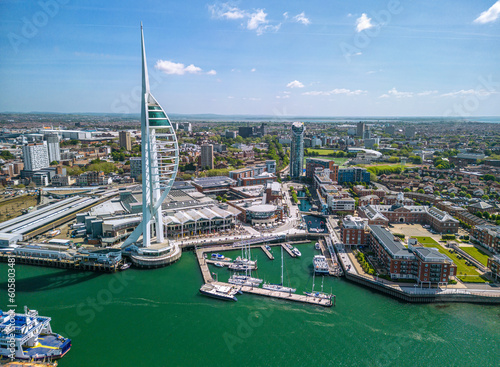 The drone aerial view of Spinnaker Tower and Portsmouth Harbour. Portsmouth is a port city and unitary authority in Hampshire, England. 