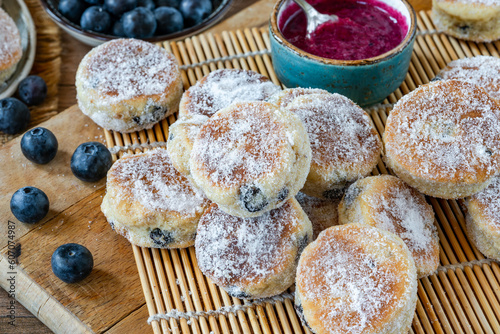 Traditional fennel Welsh cakes with blueberry coulis