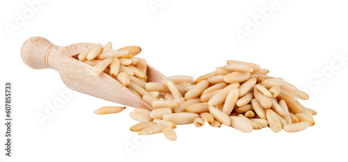 wooden scoop with pine nuts on transparent background. png file