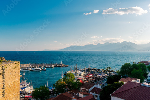 Panorama view from a high point on part of the fortress wall and the old port of Kaleichi in the Turkish city of Antalya. Panoramic view of part of the fortress wall and the old port 