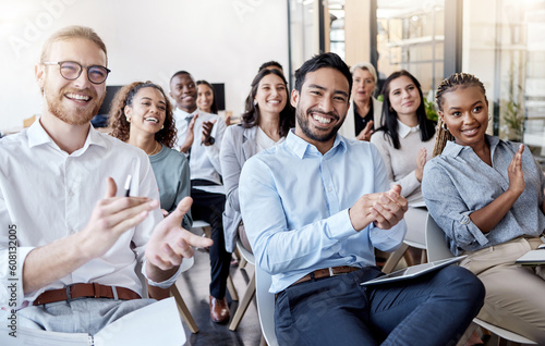 Portrait, applause and business man in an audience with a group of people clapping for a victory or achievement. Winner, wow and motivation with a team of colleagues in a coaching or training seminar