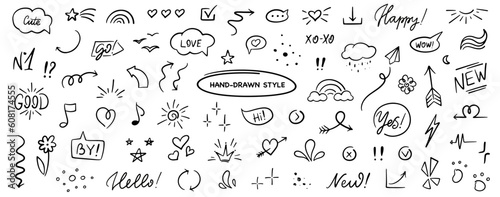 Hand drawn doodle set. Star, heard, arrow, rainbow, cloud, note, wow, lightning vector design.