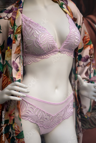 Closeup of pink underwear on mannequin in a fashion store showroom