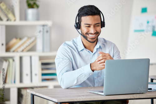 Laptop, customer service and remote work with a man consultant in his home office for support or help. Computer, call center and contact us with a male employee consulting for crm or telemarketing