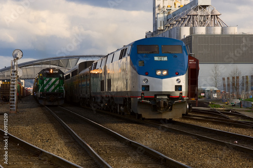 P-40 Diesel Locomotive passing a Freight Train in a rail yard