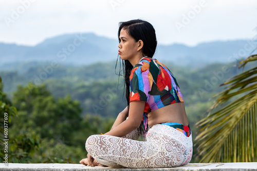 asian girl in a landscape jungle