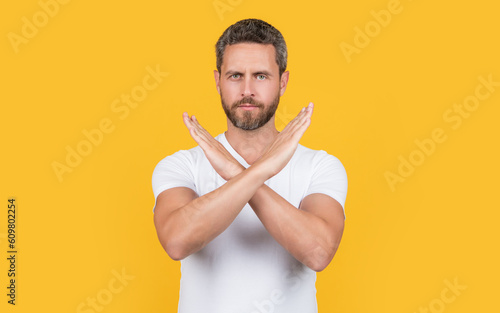 man refuse with denial gesture in studio. photo of denial man show refuse. man refuse and denial.