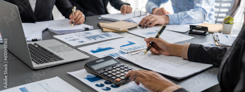 Auditor and accountant team working in office, analyze financial data and accounting record with calculator. Accounting company provide finance and taxation planning for profitable cash flow. Insight