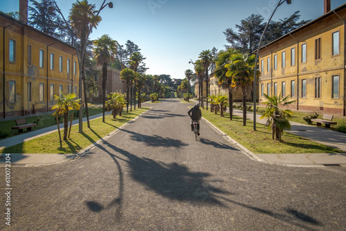 The central boulevard of the old infamous mental hospital in the city of Imola; Closed today waiting for a new destination; Imola, Province of Bologna, Emilia Romagna, Italy