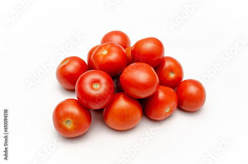 Fresh cocktail tomatoes isolated on white