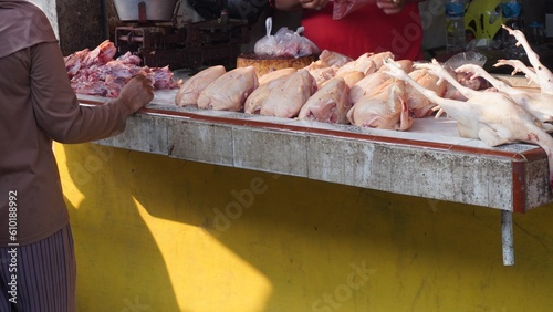 Selective focus some whole chicken meat at the traditional market 