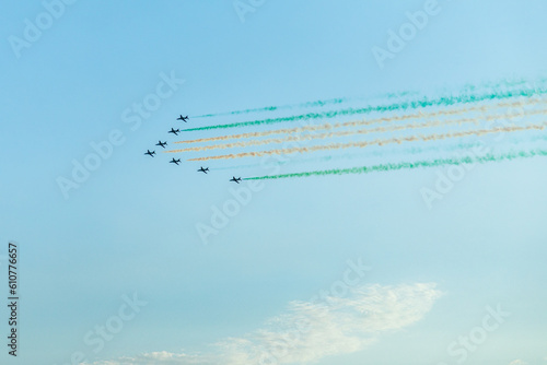 Fighter jets squadron with traces in Saudi Arabian national flag colors, at Jeddah air show