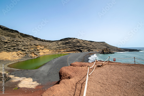 a landscape image overlooking the green lake on the beach of El Golfe in Lanzarote.