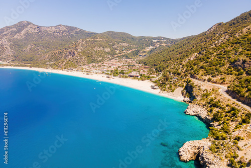 Oludeniz resort village on Aegean sea coast in Turkey, aerial wide shot