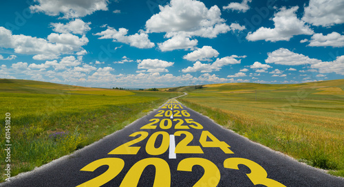 The word 2024 to 2029 written on road in the middle of empty countryside asphalt road at golden sunrise. Concept of planning and challenge, business strategy, new life change