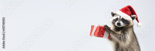 Banner with Cute raccoon in santa hat dances with red gift on white background. Merry Christmas concept. Generative AI