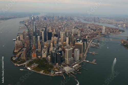 Drone view of the cityscape of New York City with skyscrapers surrounded by water in USA