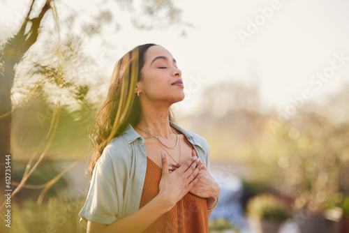 Mixed race woman relax and breathing fresh air outdoor at sunset