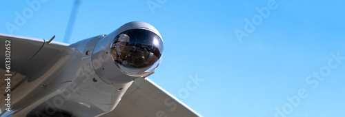 Camera in the head of an unmanned military drone close-up, modern military equipment